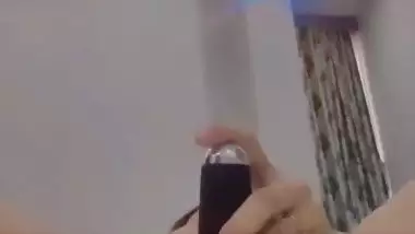 Nude Bhabhi presses boobs and fingers her pussy