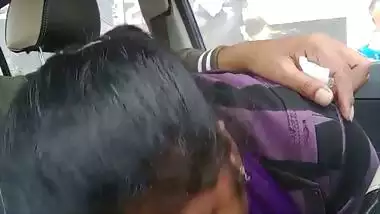 Telugu woman gives a desi blowjob to her man in a car
