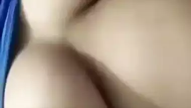 Beautiful desi girl lifting top to reveal sexy boobs