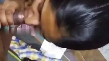 Cute girlfriend in bra giving blowjob to boyfriend