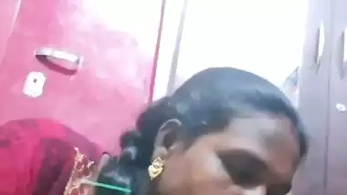 Mature tattooed Tamil wife giving handjob to husband