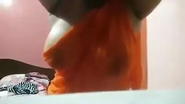 Hot Mallu wife enjoying her own huge melons